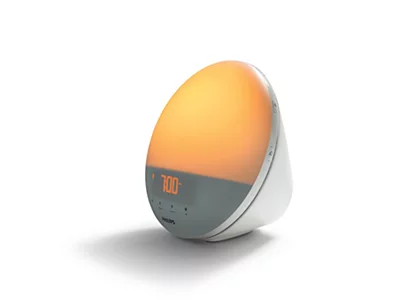 Philips SmartSleep sunrise wake-up light on a bedside table