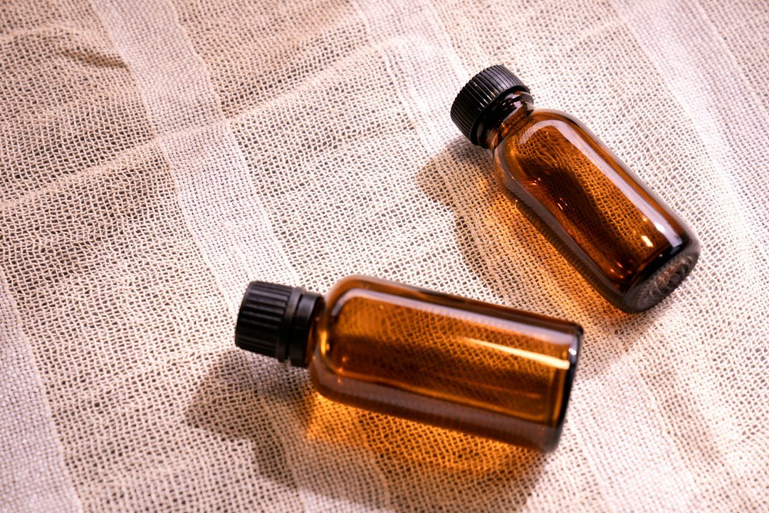 Amber bottles arranged against a natural background
