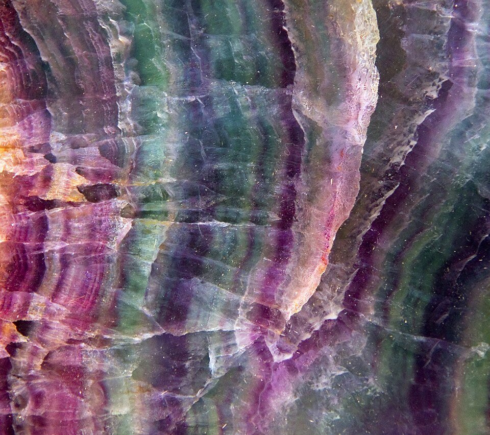 Green and purple fluorite crystal specimen